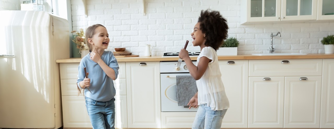 children singing and playing