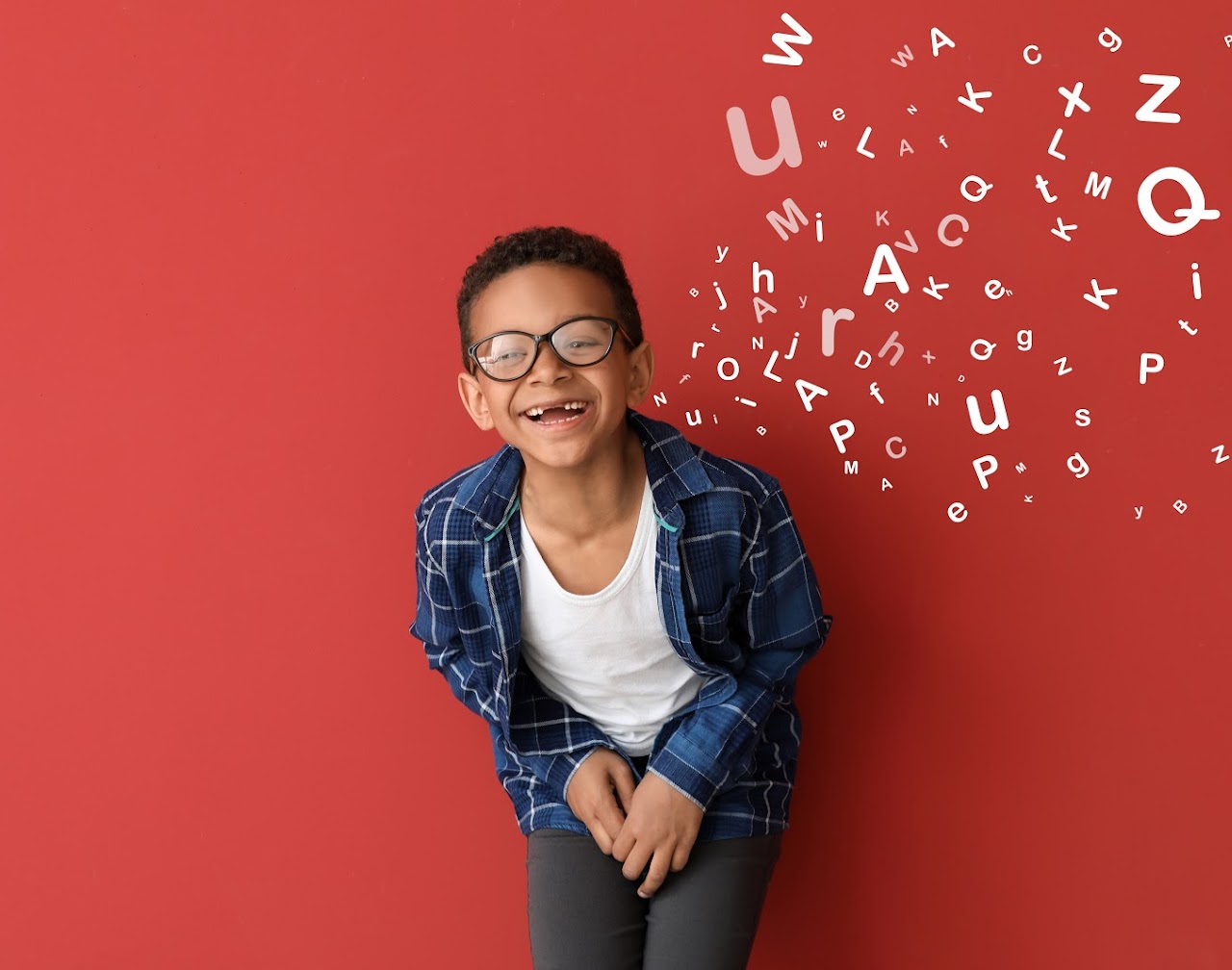 school aged child laughing