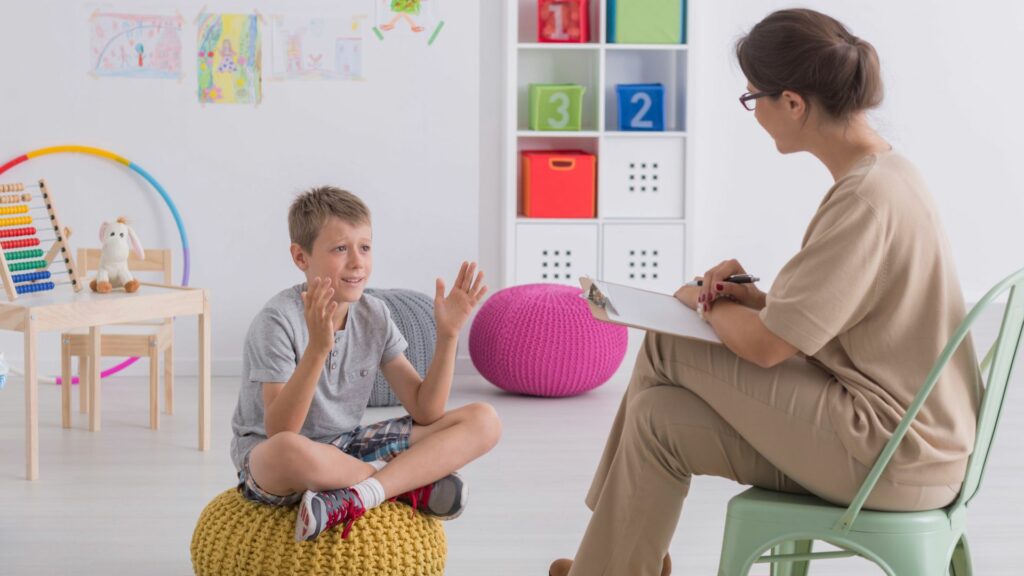 Child talking to therapist