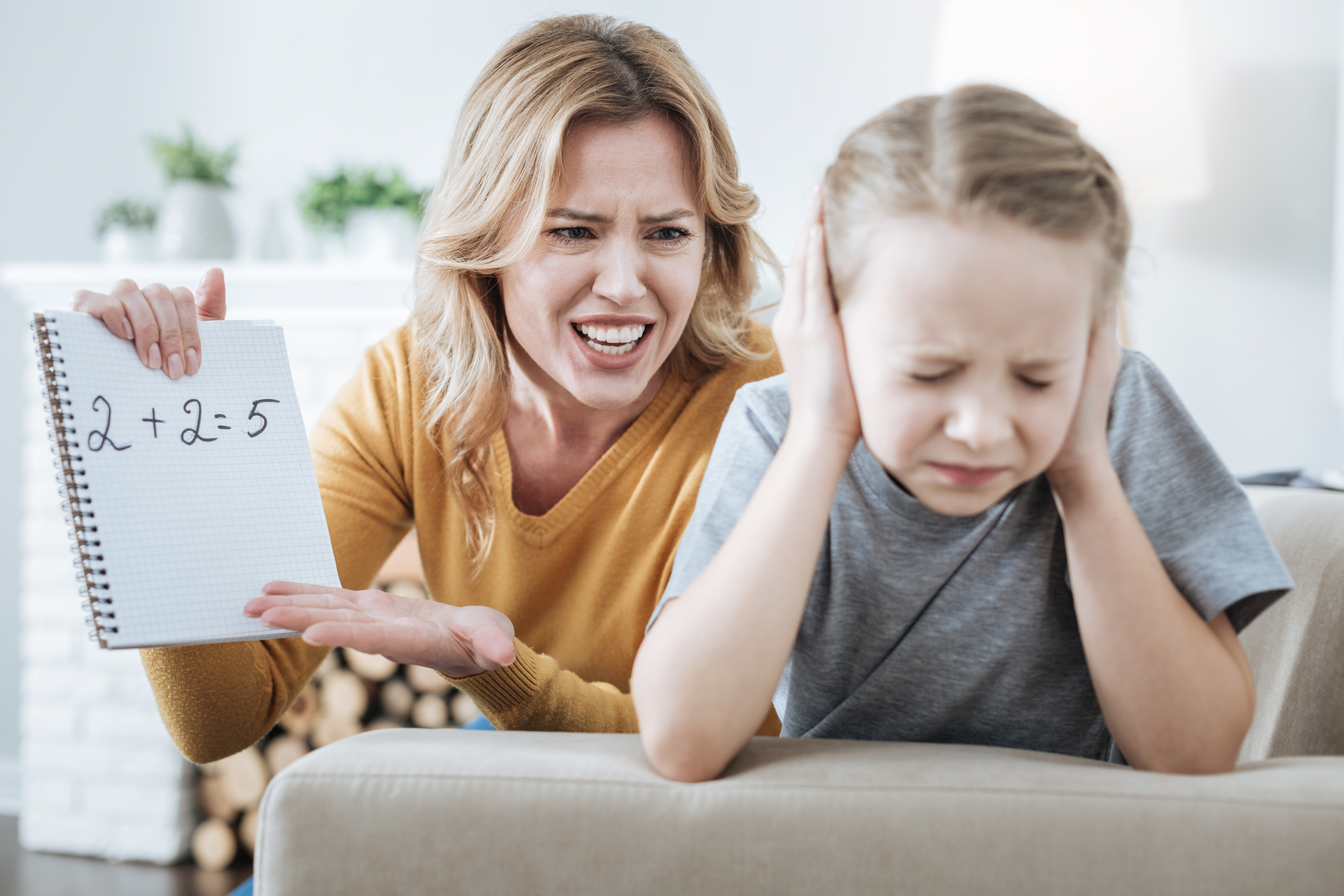 Irritated mother shouting at her child